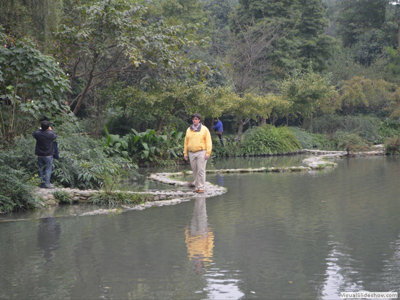 Brad crossing the main pond in the park.