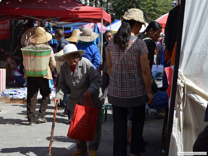 A old woman with her shopping bag.