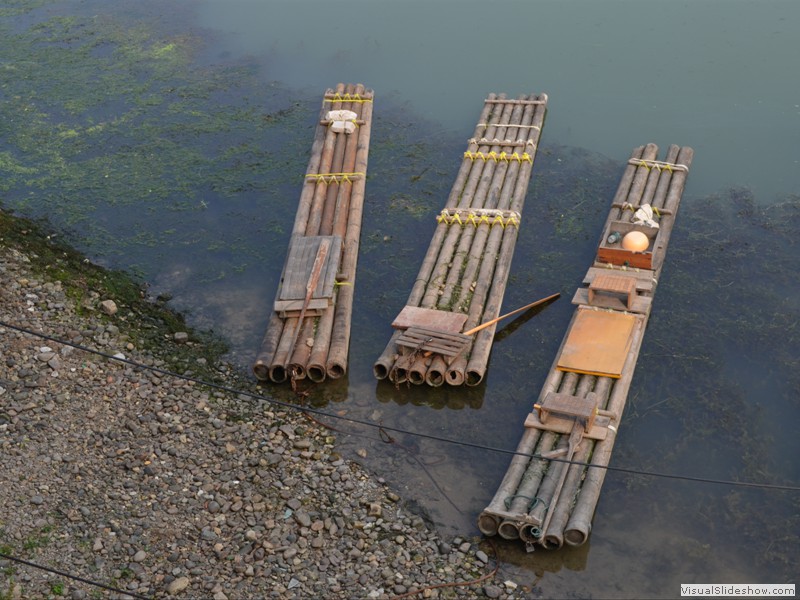 The local boat are bamboo logs tied together.