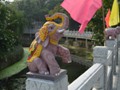 Decorations on the fench posts in the park.