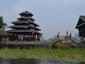 A pretty little pagoda next to the river. 