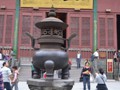 One of the many huge cast iron pots in the temple.