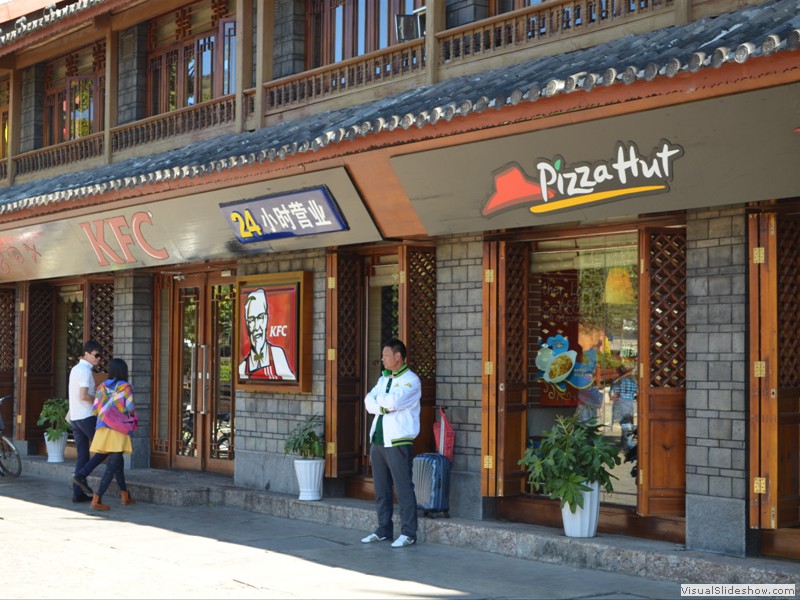 Pizza Hut and KFC compete for customers.