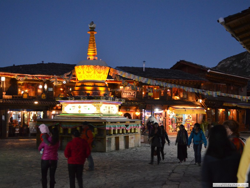 A Tibetian prayer monument in a town square.