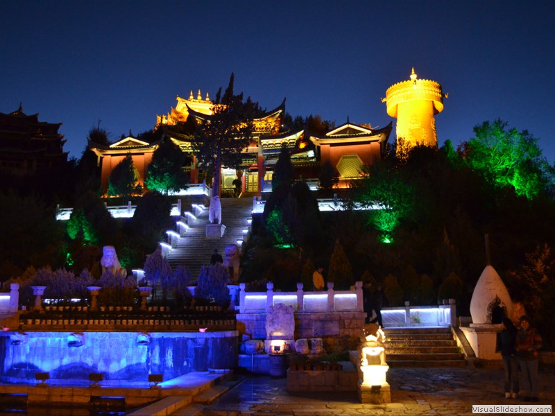 The monastery in Shangri-La lit up in the evening.