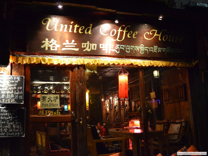 The "United Coffee House" written in Chinese and Tibetian on the sign.