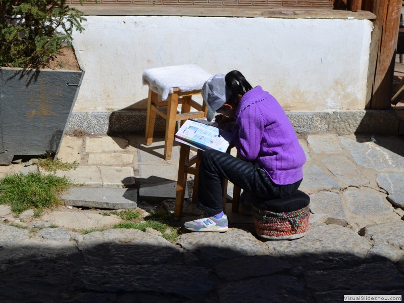 A young girl doing her homework!