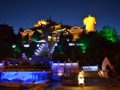 The monastery in Shangri-La lit up in the evening.