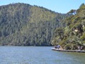 The walkway goes all the way around the lake.