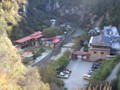 A hot springs spa in the valley below.