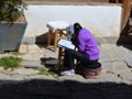 A young girl dowing her homework!