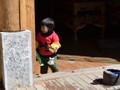 A cute little girl in the market place.