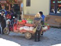 A street vendor selling vegetables.