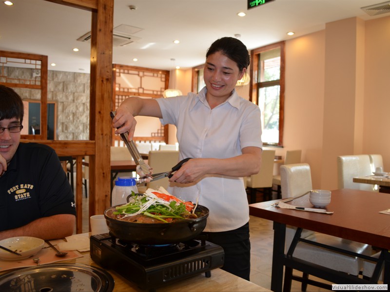 Our chef prepares dinner.